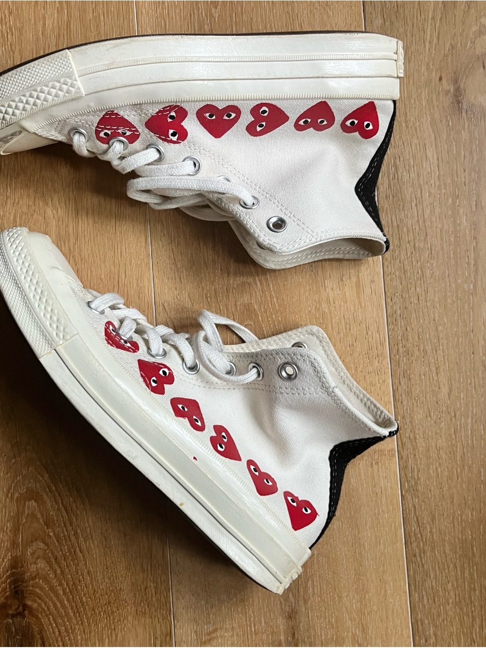 Comme des Garcons PLAY White Canvas High-Top Sneakers with Red Heart Motif